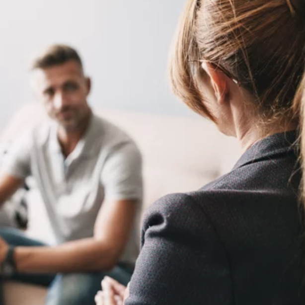 Caregiver supporting an elderly resident with honesty and compassion at Aurem Care